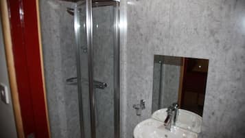 Shower, free toiletries, hair dryer, towels