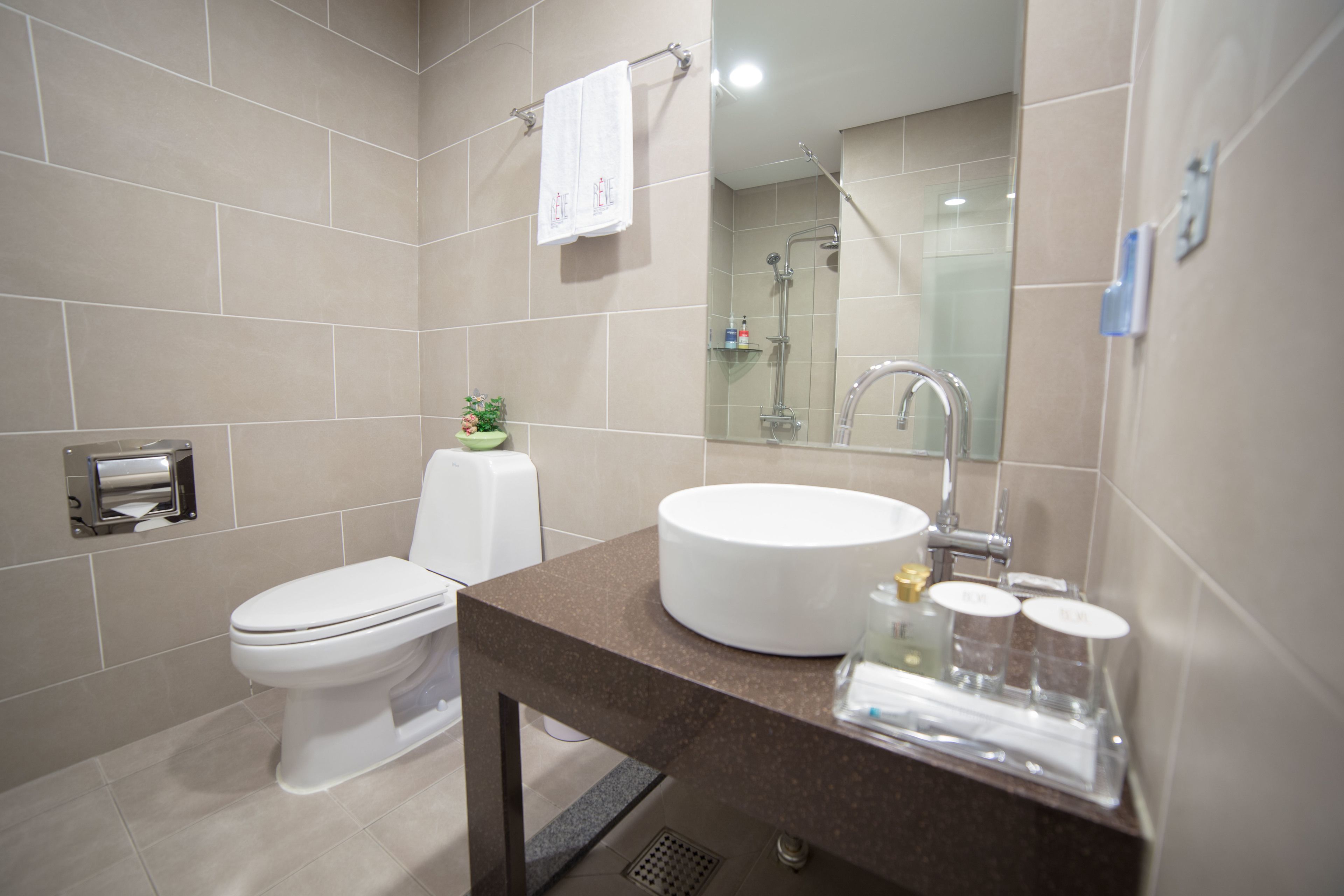 free toiletries, hair dryer, slippers, heated floors