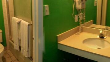 Combined shower/tub, deep soaking tub, free toiletries, towels
