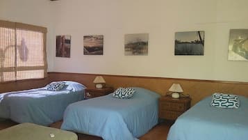 Economy Room | 2 bedrooms, in-room safe, bed sheets