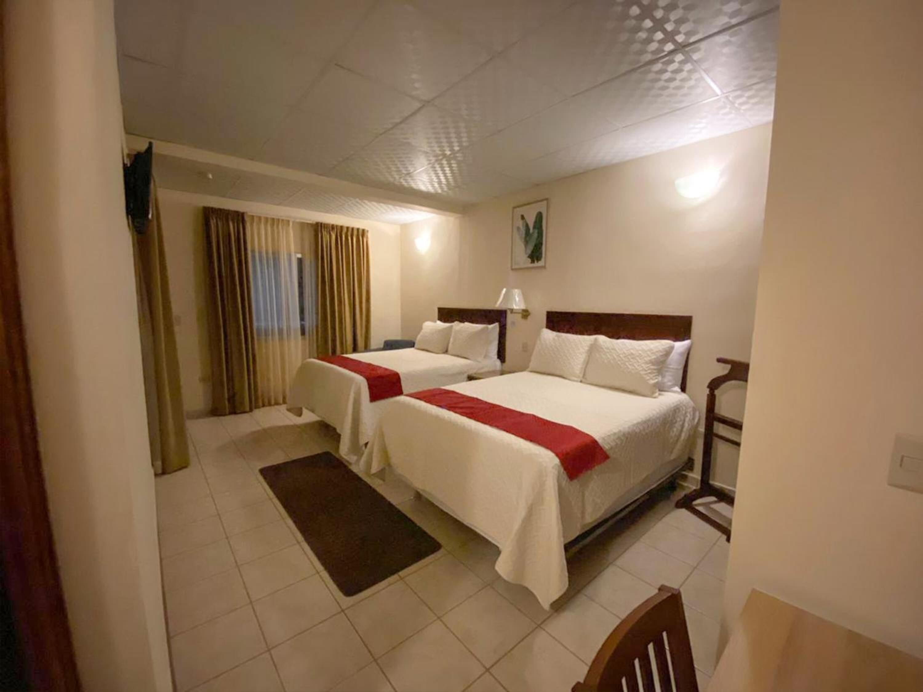 premium bedding, down duvets, minibar, in-room safe