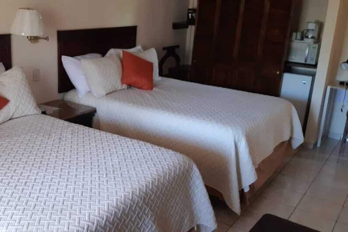 Premium bedding, down duvets, minibar, in-room safe