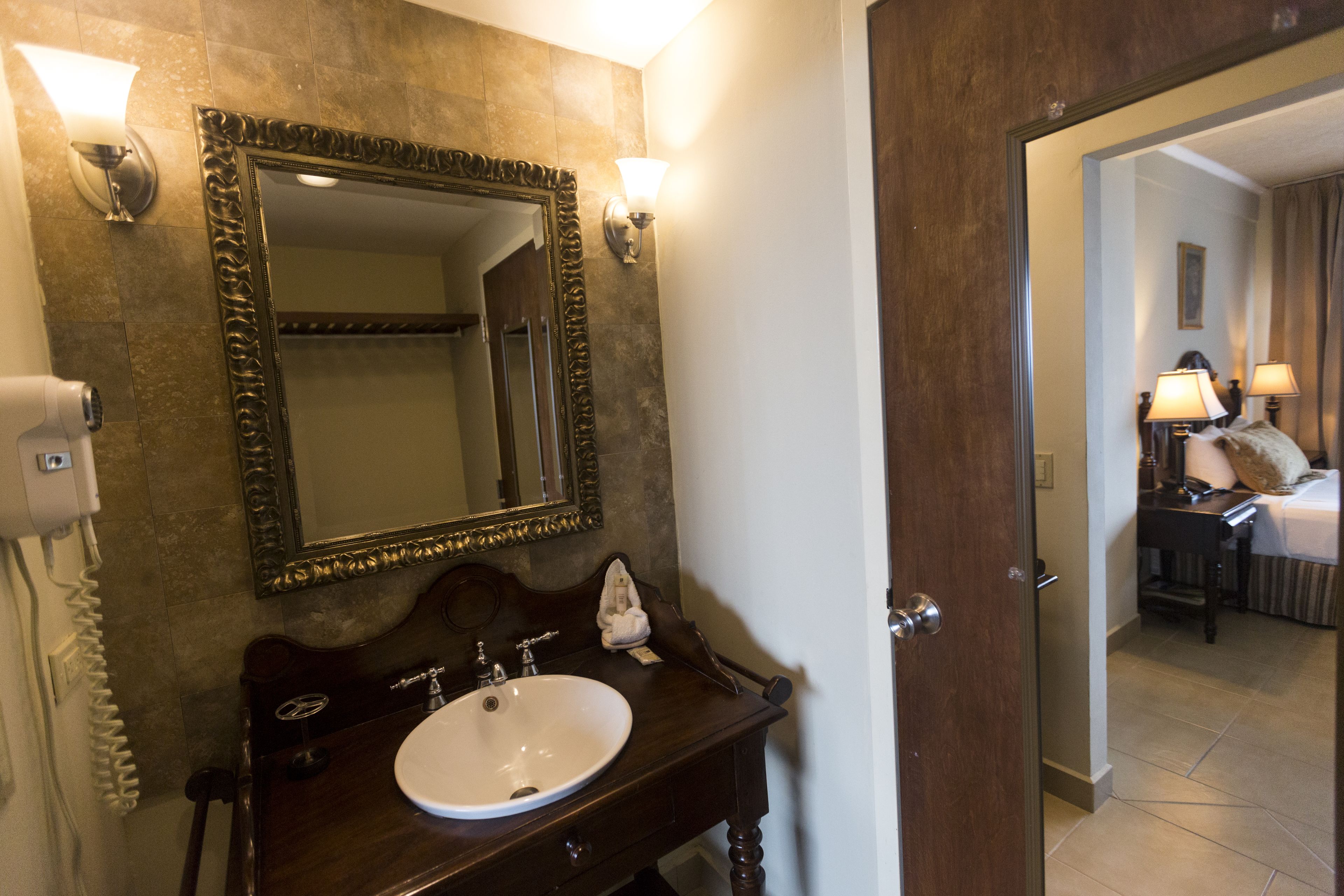 junior studio suite, 1 queen bed | bathroom | shower, free toiletries, hair dryer, towels