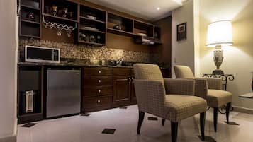 Suite Deluxe | Zona de menjador de l'habitació
