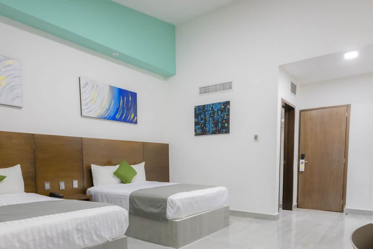 Standard Quadruple Room | In-room safe, iron/ironing board, free WiFi, bed sheets