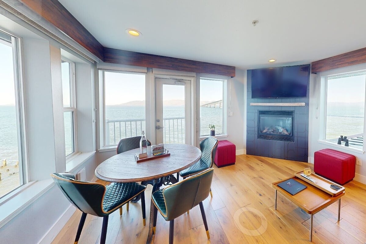 Pilot House, Balcony, River View (No Pets) | Living area | 55-inch flat-screen TV with cable channels, TV, fireplace
