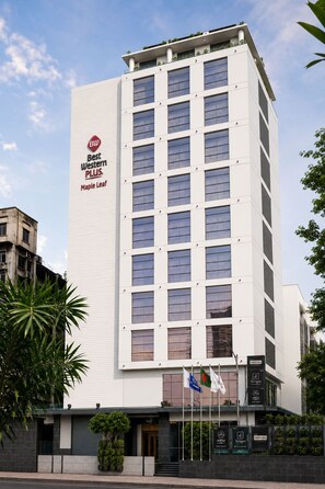 A tall, modern hotel building with a prominent 'Best Western PLUS Maple Leaf' sign. - Best Western Plus Maple Leaf (Dhaka)