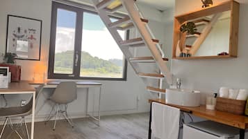 Duplex | Down comforters, blackout drapes, free WiFi