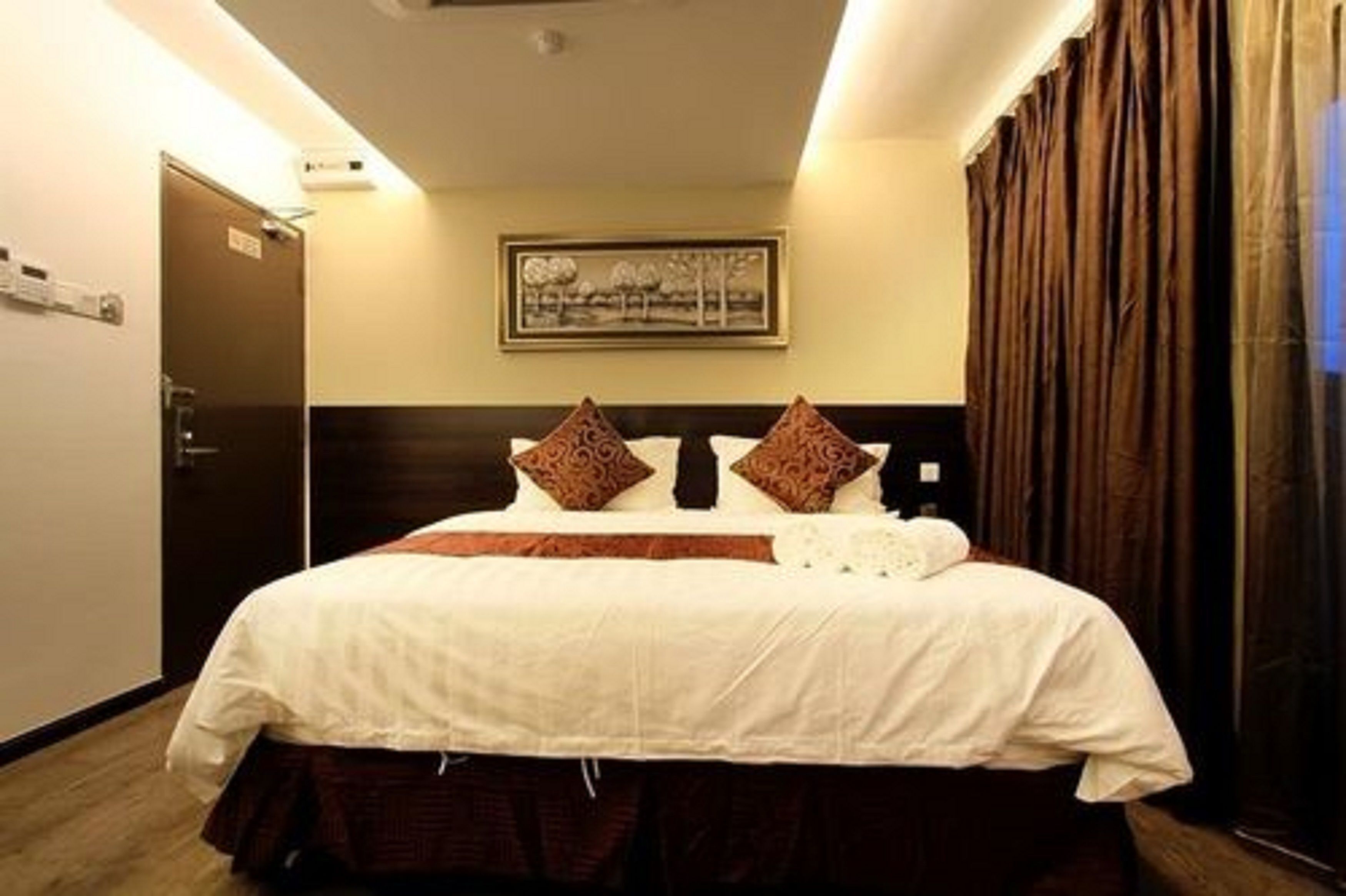 Premium bedding, Tempur-Pedic beds, desk, laptop workspace