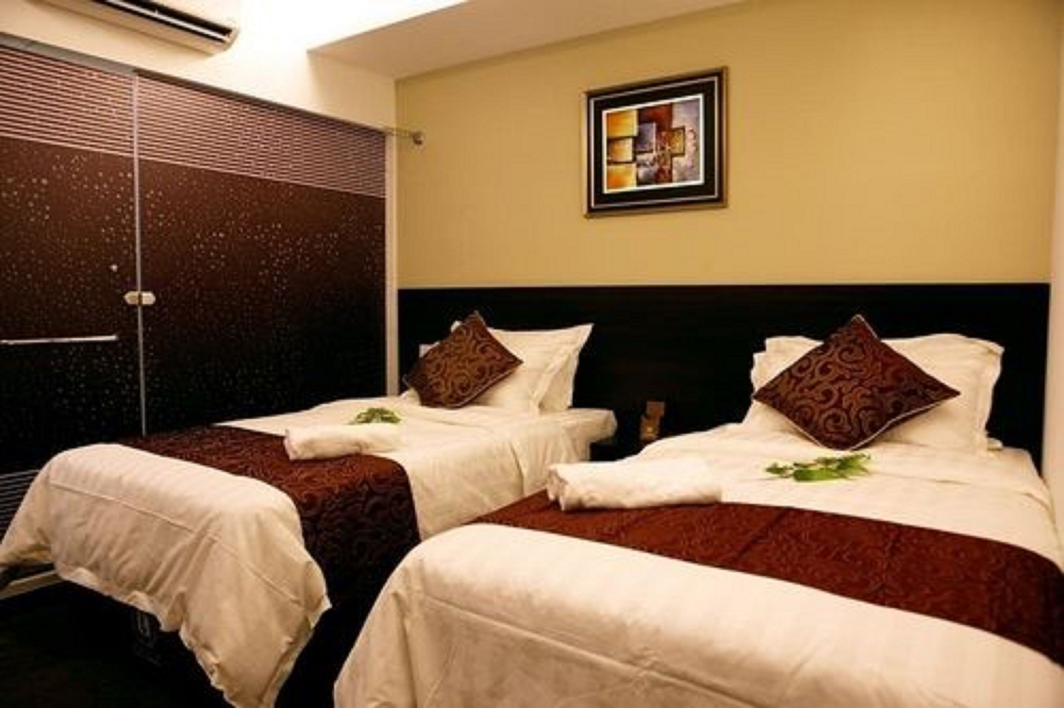 Premium bedding, Tempur-Pedic beds, desk, laptop workspace