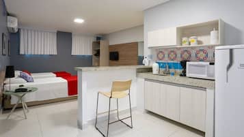 Apartamento executivo, 1 quarto | Frigobar, cofres nos quartos, escrivaninha