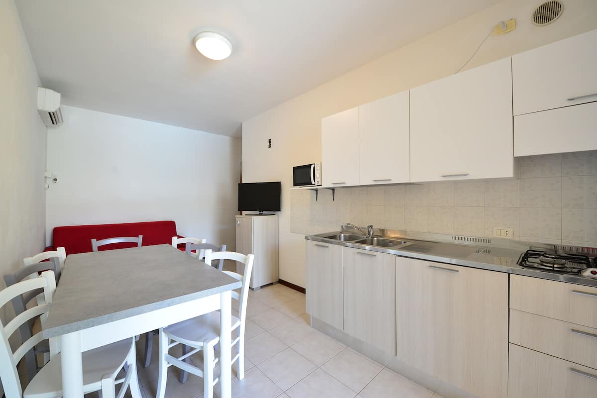 Departamento, 1 habitación (Glicine) | Cocina privada | Refrigerador, parrilla de estufa y cafetera y tetera