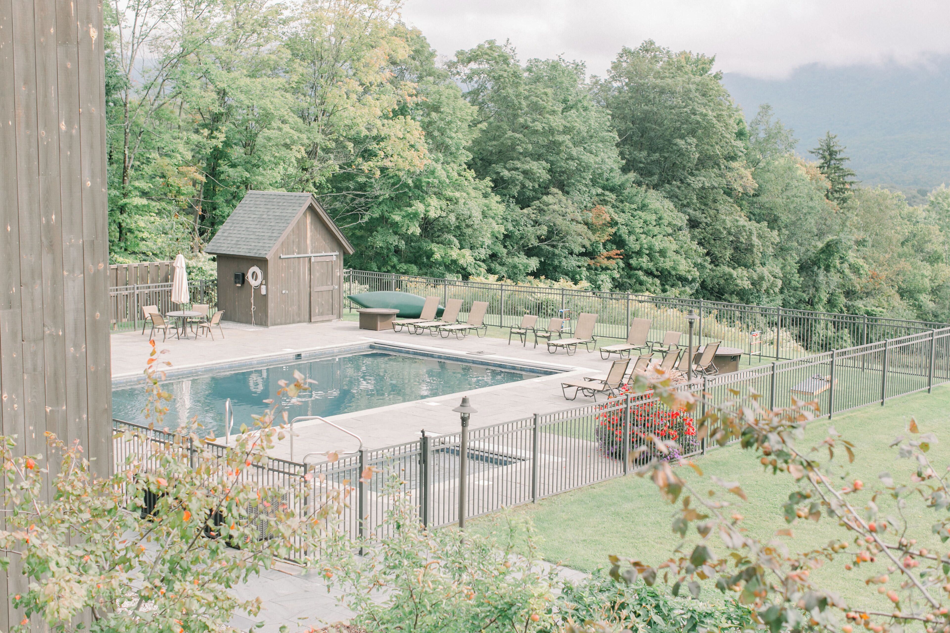 seasonal outdoor pool, open 9:00 am to 9:00 pm, pool umbrellas