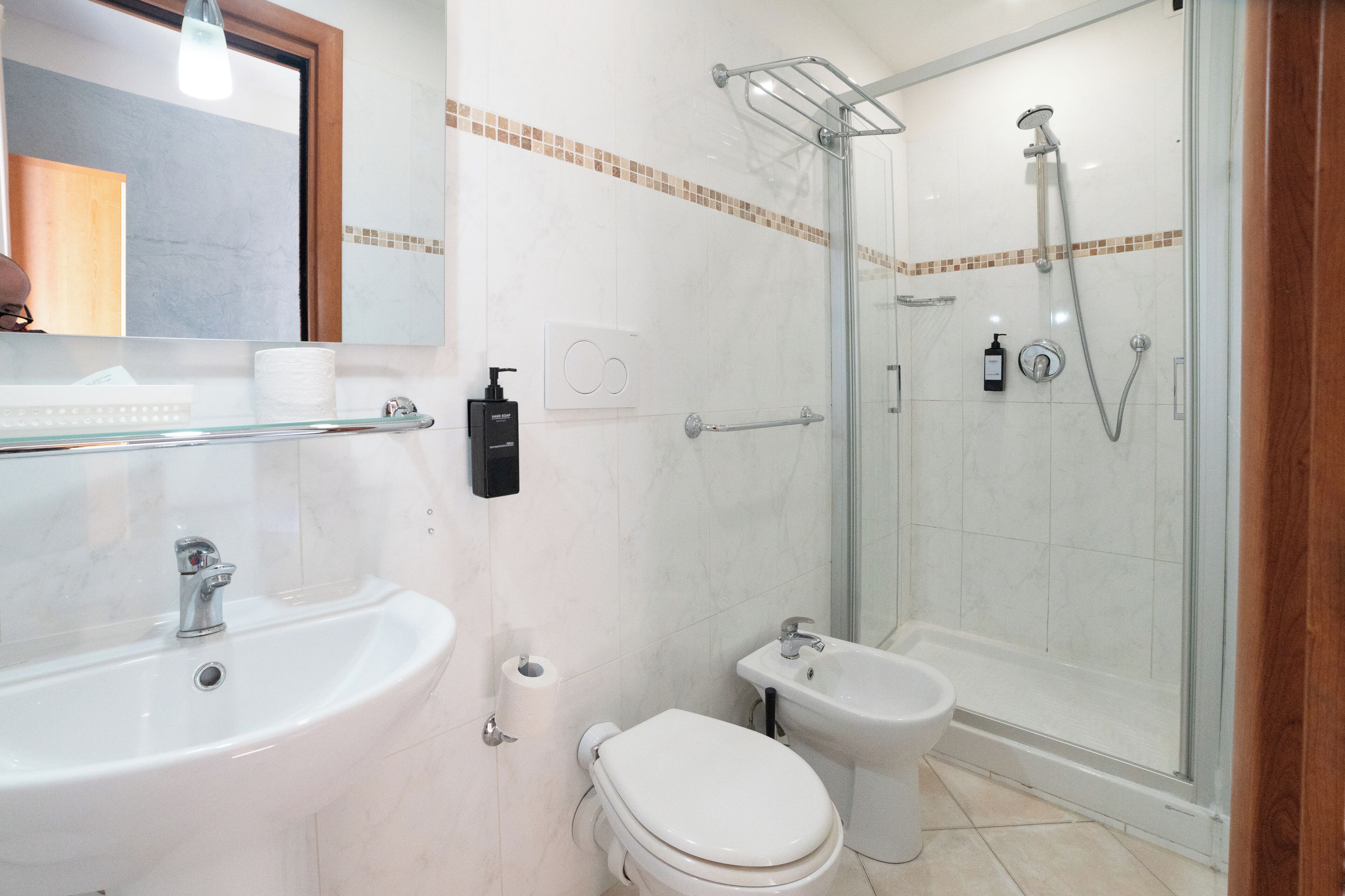 shower, rainfall showerhead, designer toiletries, hair dryer