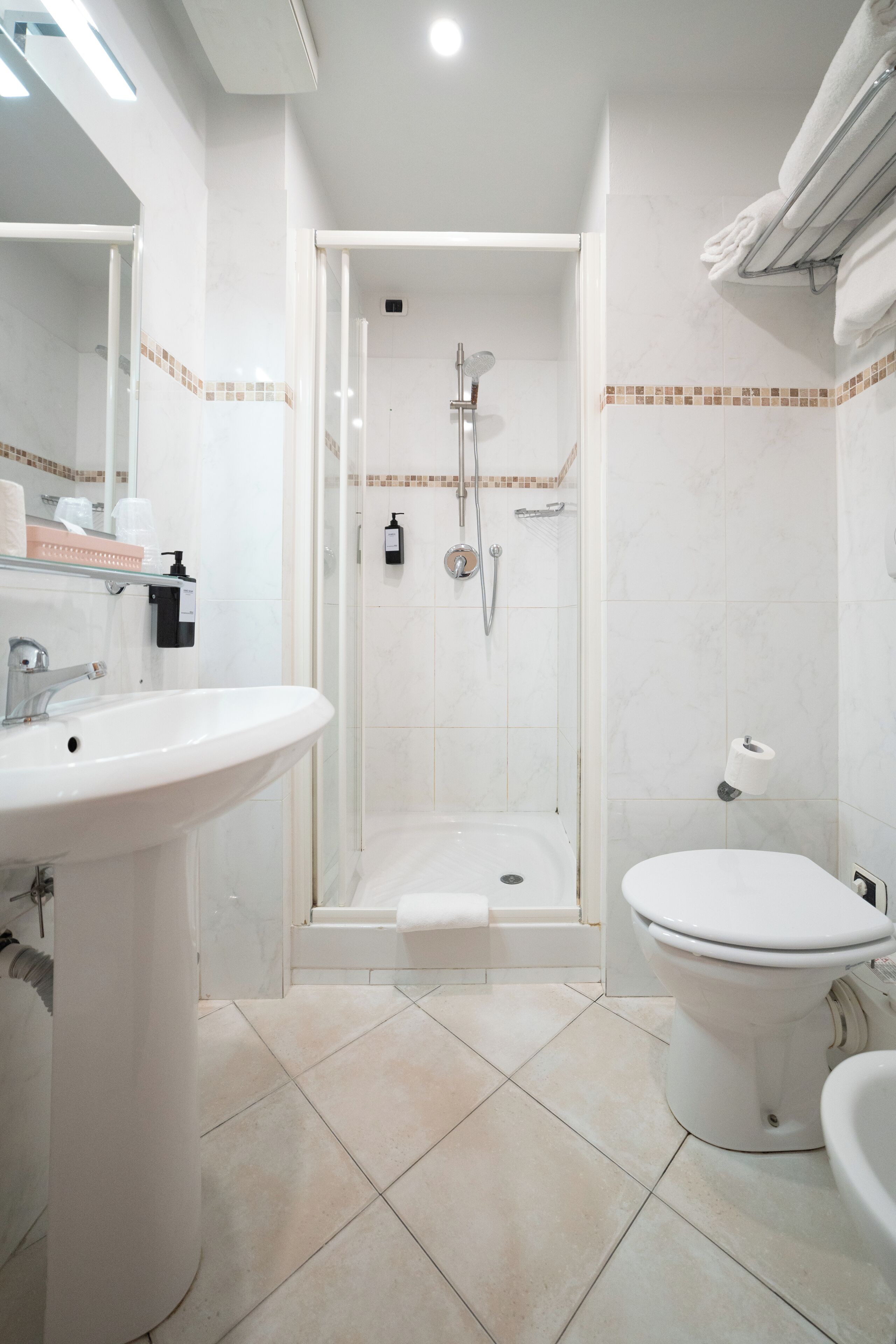 shower, rainfall showerhead, designer toiletries, hair dryer