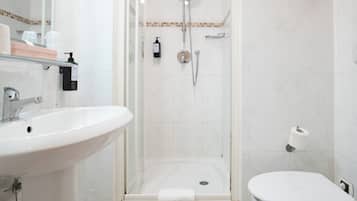 Shower, rainfall showerhead, designer toiletries, hair dryer
