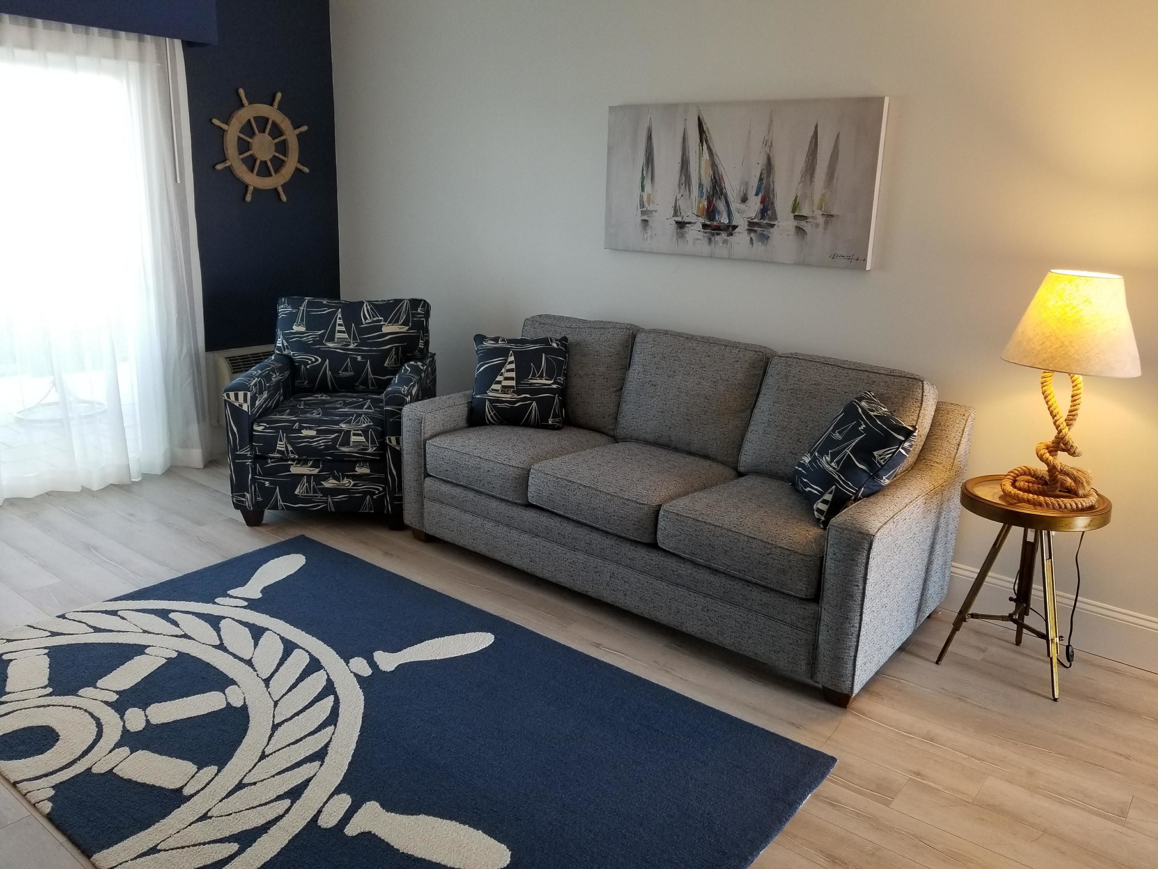 signature suite, 2 queen beds, refrigerator & microwave, marina view | living room | flat-screen tv