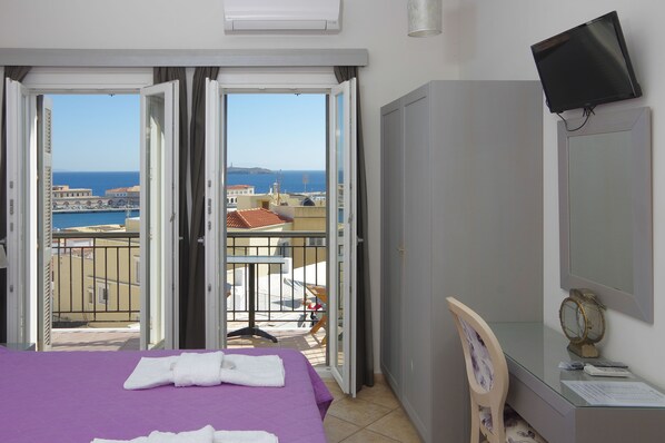 Suite, 2 Bedrooms, Sea View | In-room safe, soundproofing, iron/ironing board, free WiFi