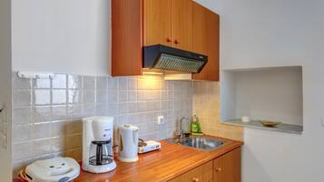 Apartment, Terrace | Private kitchen | Fridge, coffee/tea maker, electric kettle