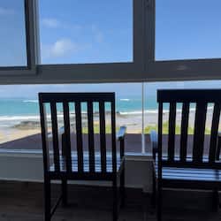 King Room with Sea View | 1 bedroom, in-room safe, bed sheets