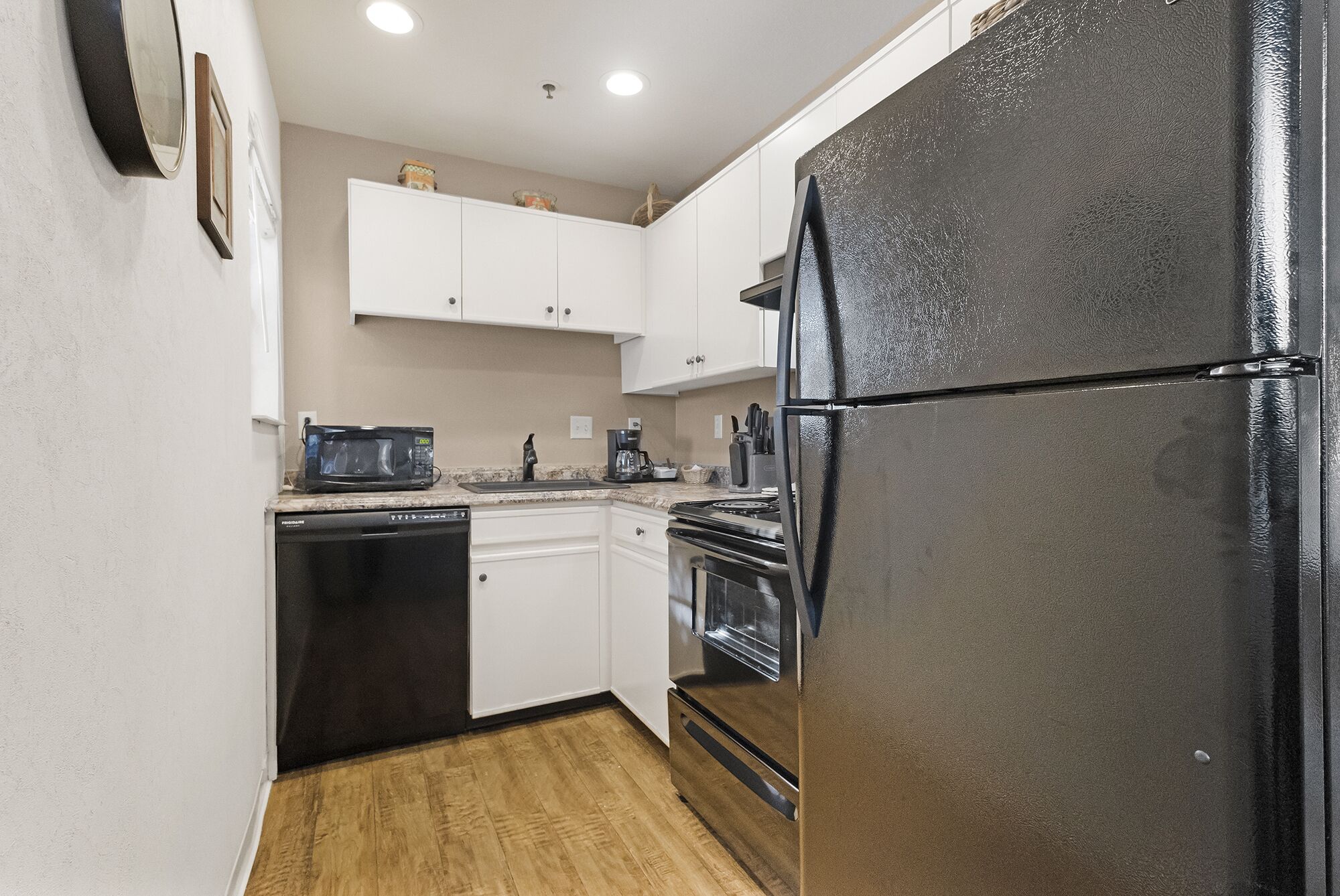 premier suite, 1 king bed with sofa bed | private kitchen | fridge, microwave, coffee/tea maker