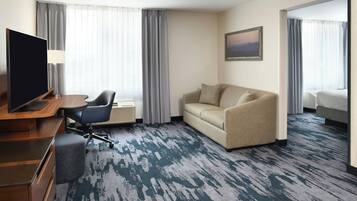 Studio Suite, 1 King Bed with Sofa bed | Living area | 32-inch LCD TV with satellite channels, TV, pay movies