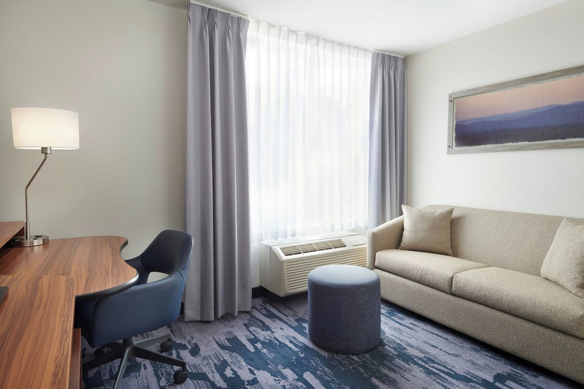 Studio Suite, Multiple Beds, Non Smoking | Living area | 32-inch LCD TV with satellite channels, TV, pay movies