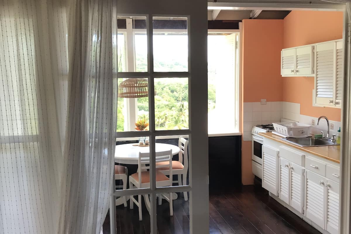 full-sized fridge, microwave, stovetop, coffee/tea maker