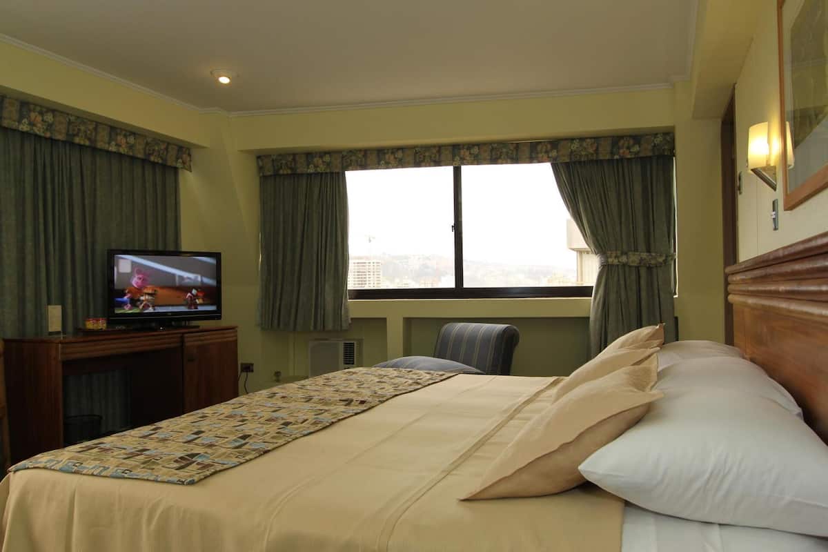 2 habitaciones, ropa de cama de alta calidad y minibar