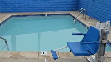Outdoor pool, open 8:00 AM to 7:00 PM, pool loungers