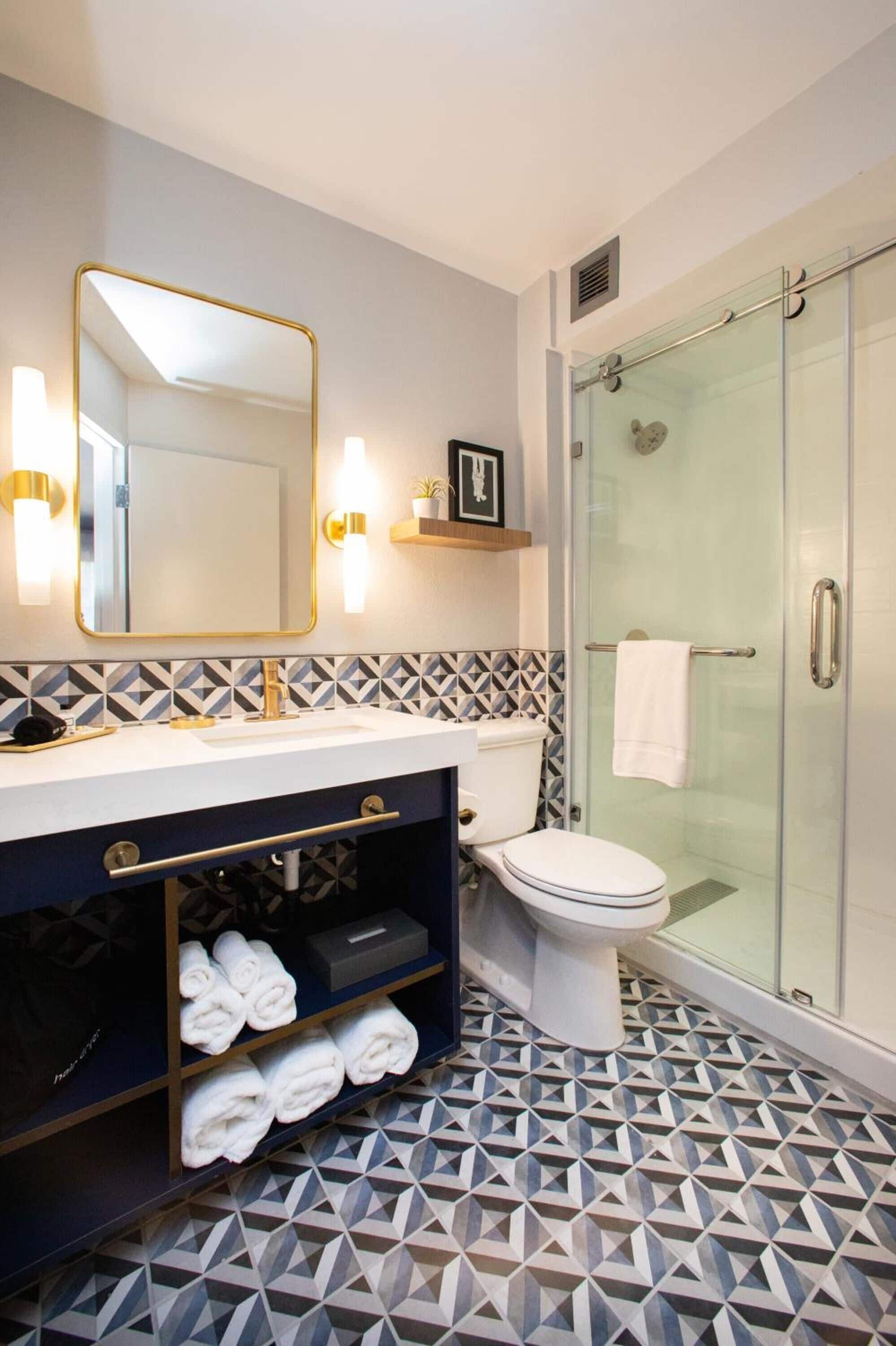 shower, free toiletries, hair dryer, bathrobes