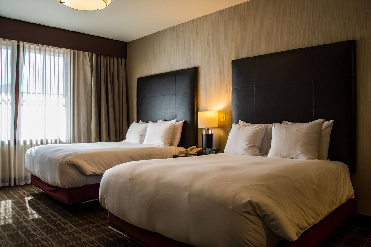 standard room, 2 queen beds, resort view | premium bedding, in-room safe, soundproofing, iron/ironing board