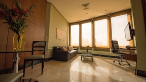 Executive Suite, 2 Double Beds | Living area | Flat-screen TV