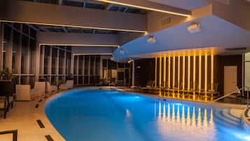 Indoor pool, open 7:00 AM to 8:00 PM, sun loungers