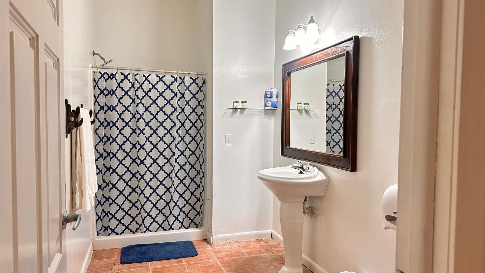 basic quadruple room, 2 queen beds | bathroom | shower, towels