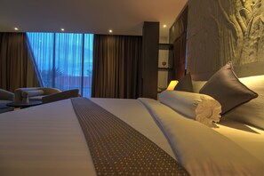Ropa de cama de alta calidad y minibar 