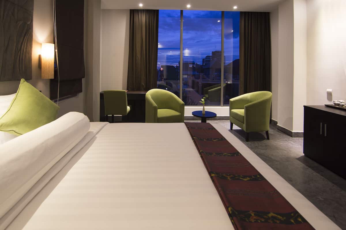 Familie suite | Luxe beddengoed, een minibar, een kluis op de kamer, een bureau