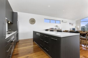 Beach House | Private kitchen | Fridge, microwave, stovetop, dishwasher