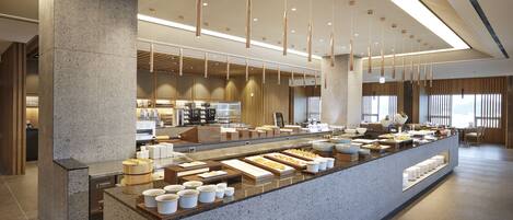A modern breakfast buffet with a variety of food items and a clean, contemporary design.