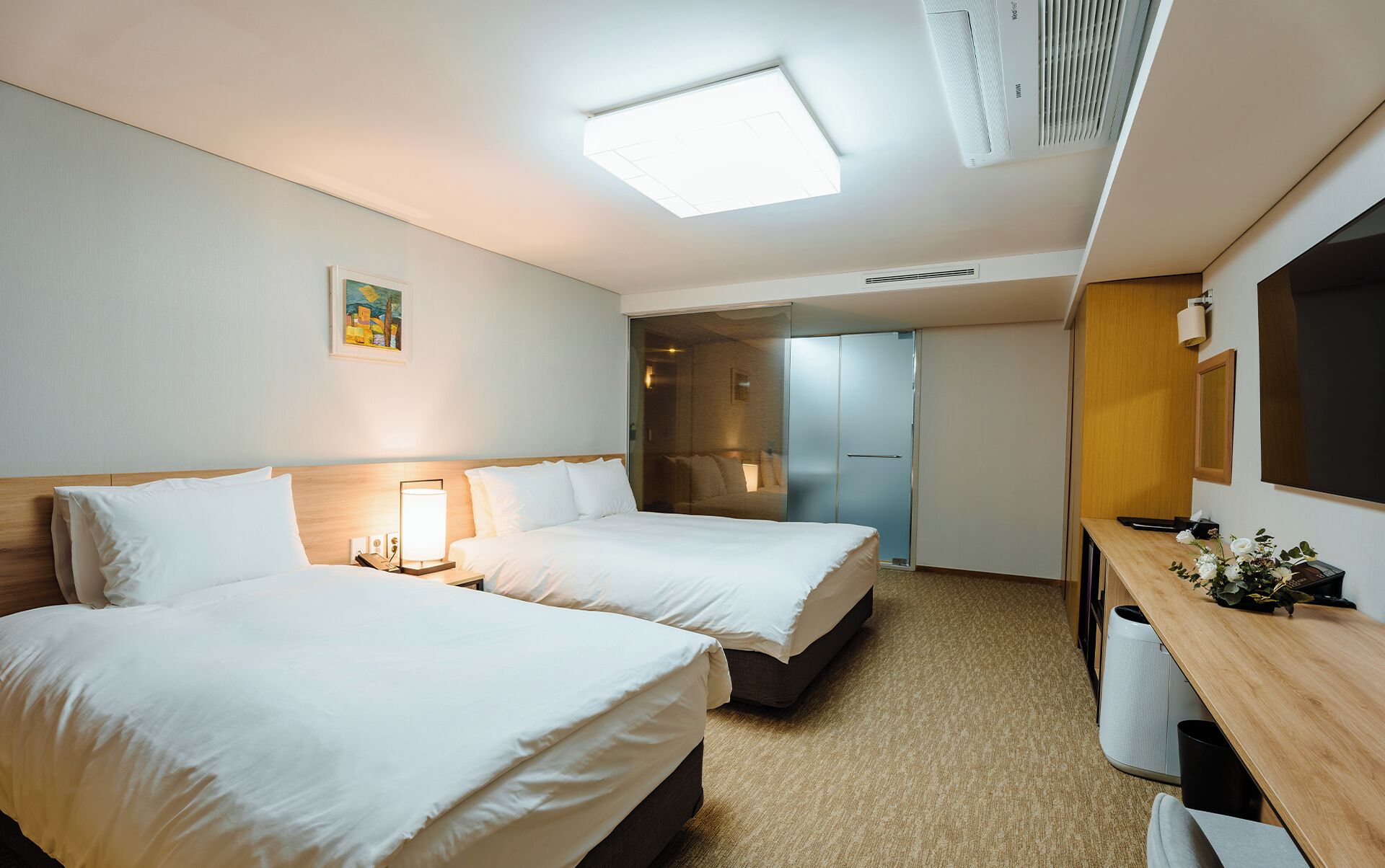 Deluxe Family Room | In-room safe, desk, laptop workspace, blackout drapes