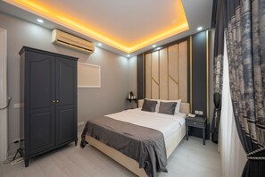 Junior suite | Luxe beddengoed, een kluis op de kamer, individueel gemeubileerd