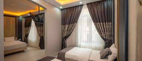 Junior Suite | 1 bedroom, premium bedding, in-room safe, individually furnished