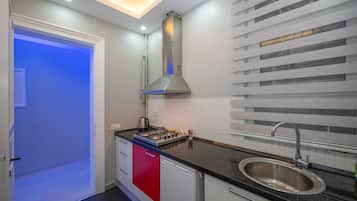 Electric kettle, cleaning supplies, paper towels