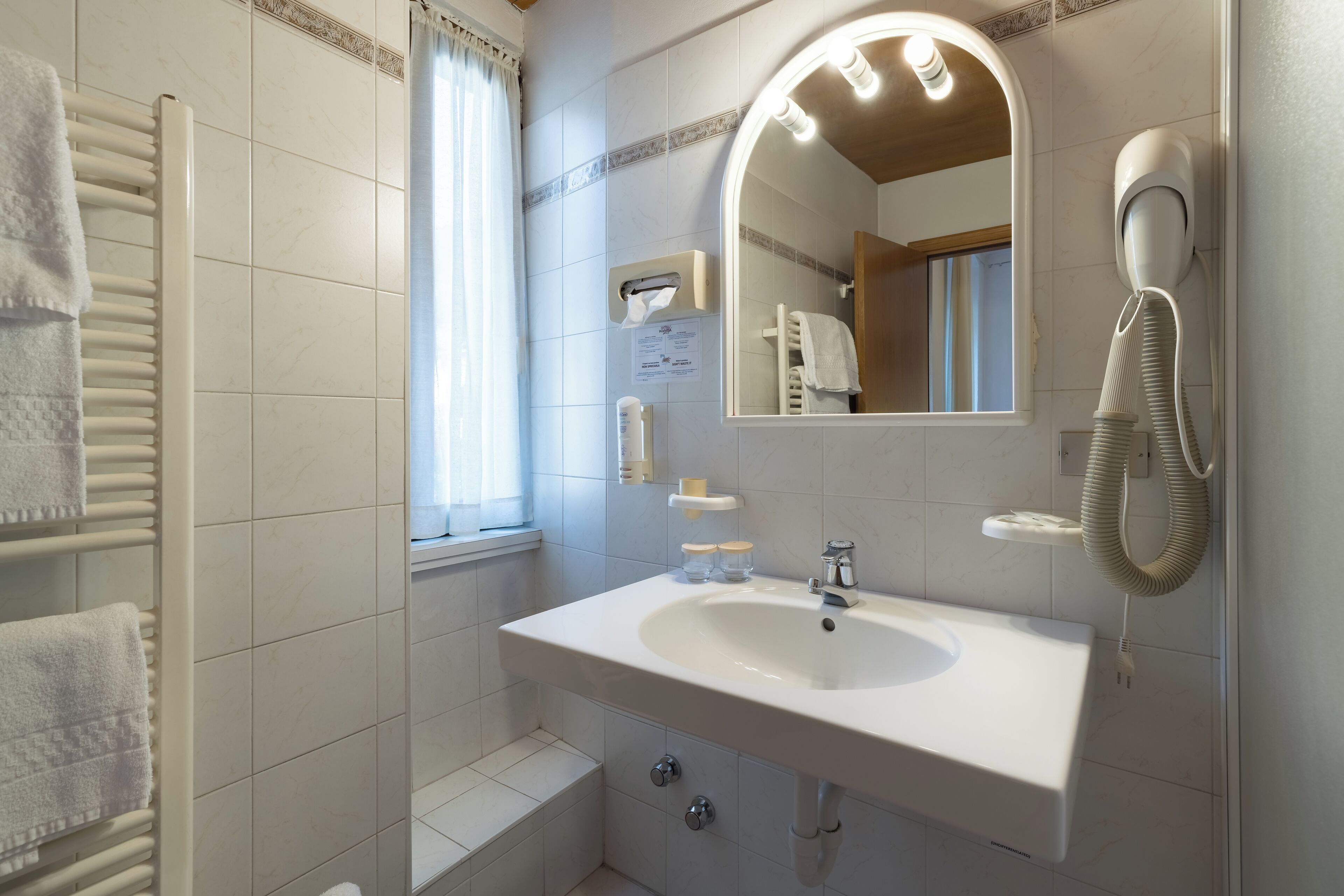 basic room | bathroom | hair dryer, bidet, towels, soap