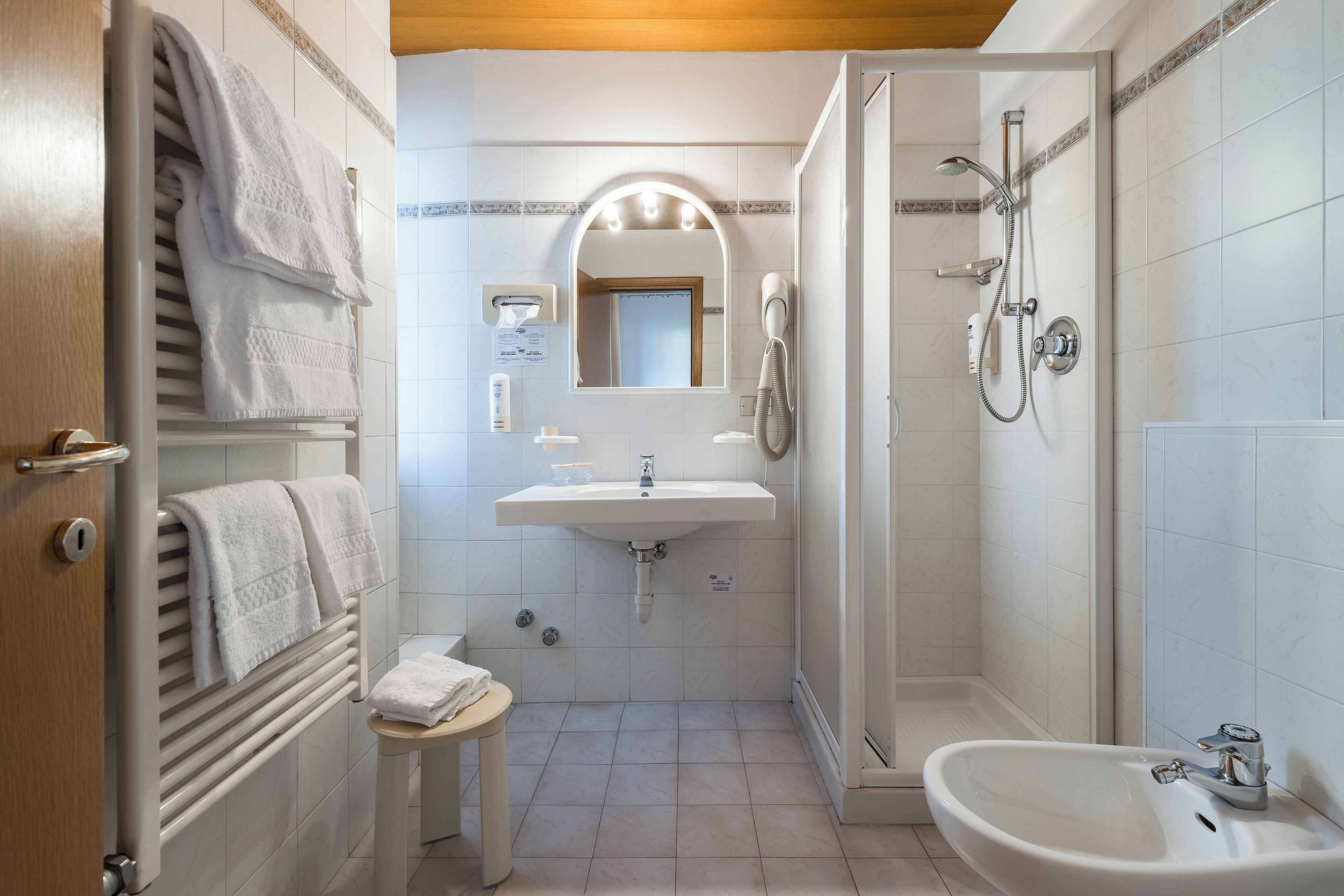 basic room | bathroom | hair dryer, bidet, towels, soap