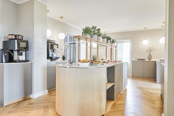 Daily buffet breakfast (EUR 14.90 per person)