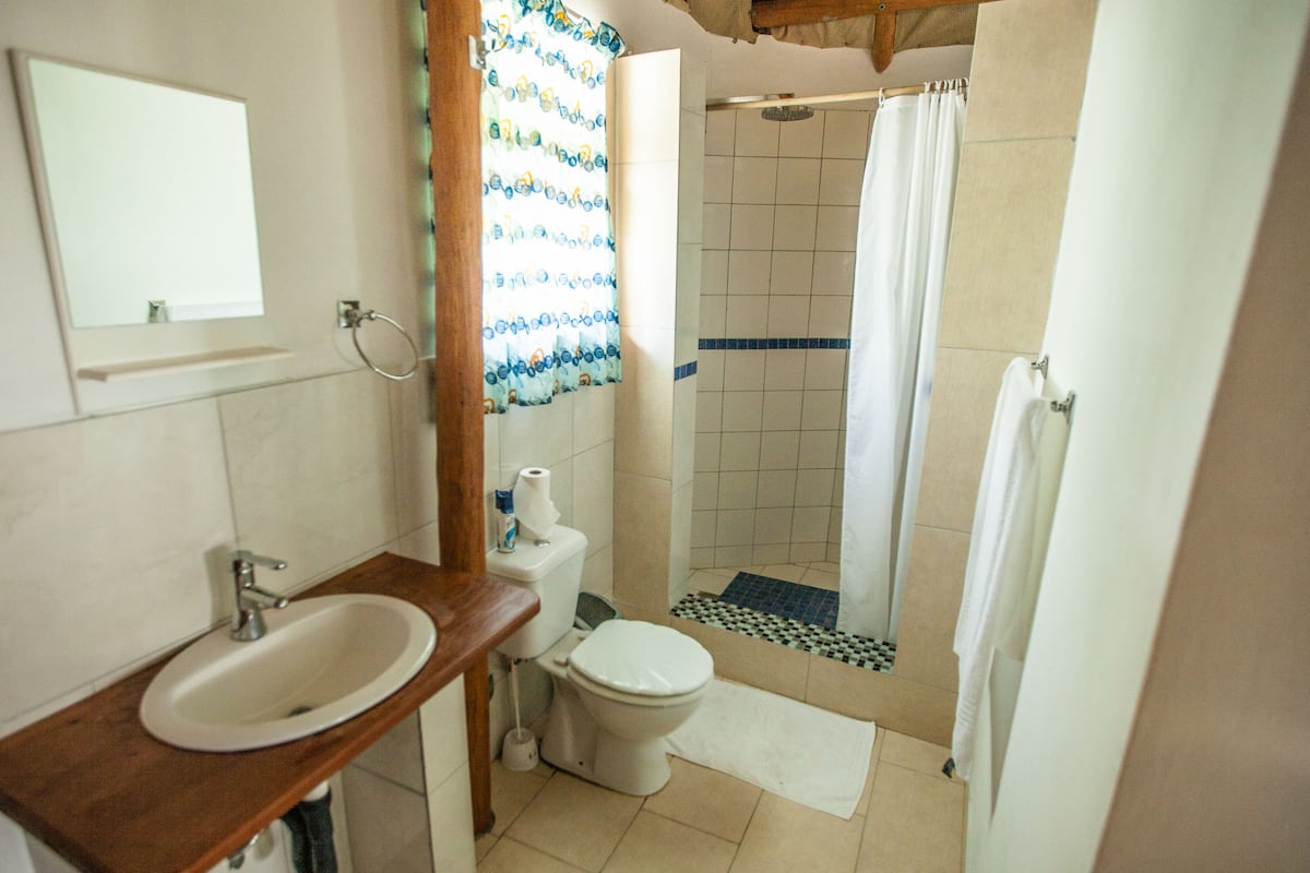 family quadruple room, beachfront | bathroom | free toiletries, hair dryer, towels