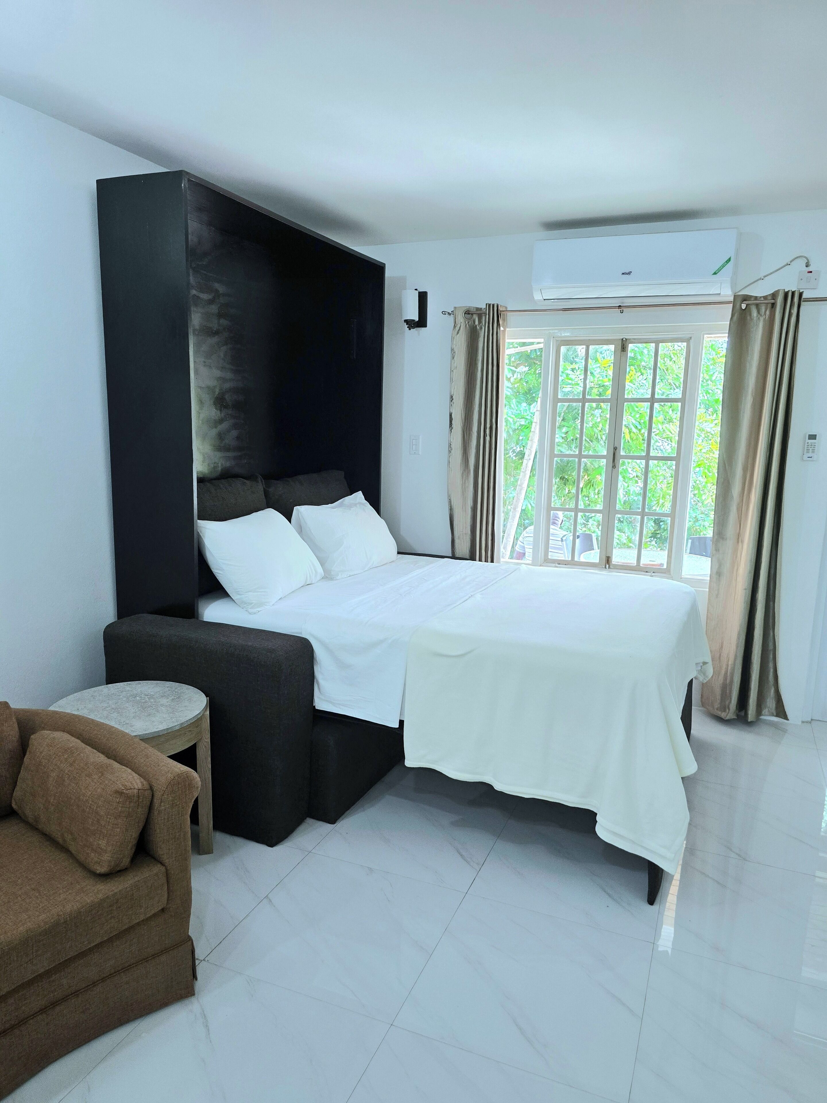 エコノミー スタジオ | 2 室のベッドルーム、低刺激性寝具、セーフティボックス (室内)、アイロン / アイロン台