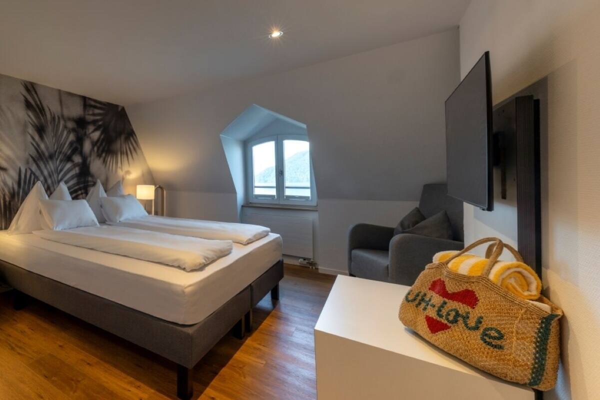Dúplex familiar, vistas al lago | Ropa de cama de alta calidad y minibar (con algunos artículos gratuitos)
