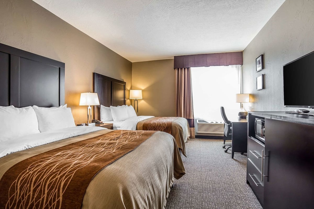 Premium bedding, pillowtop beds, desk, blackout drapes